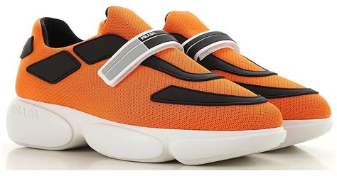 prada orange slip ons